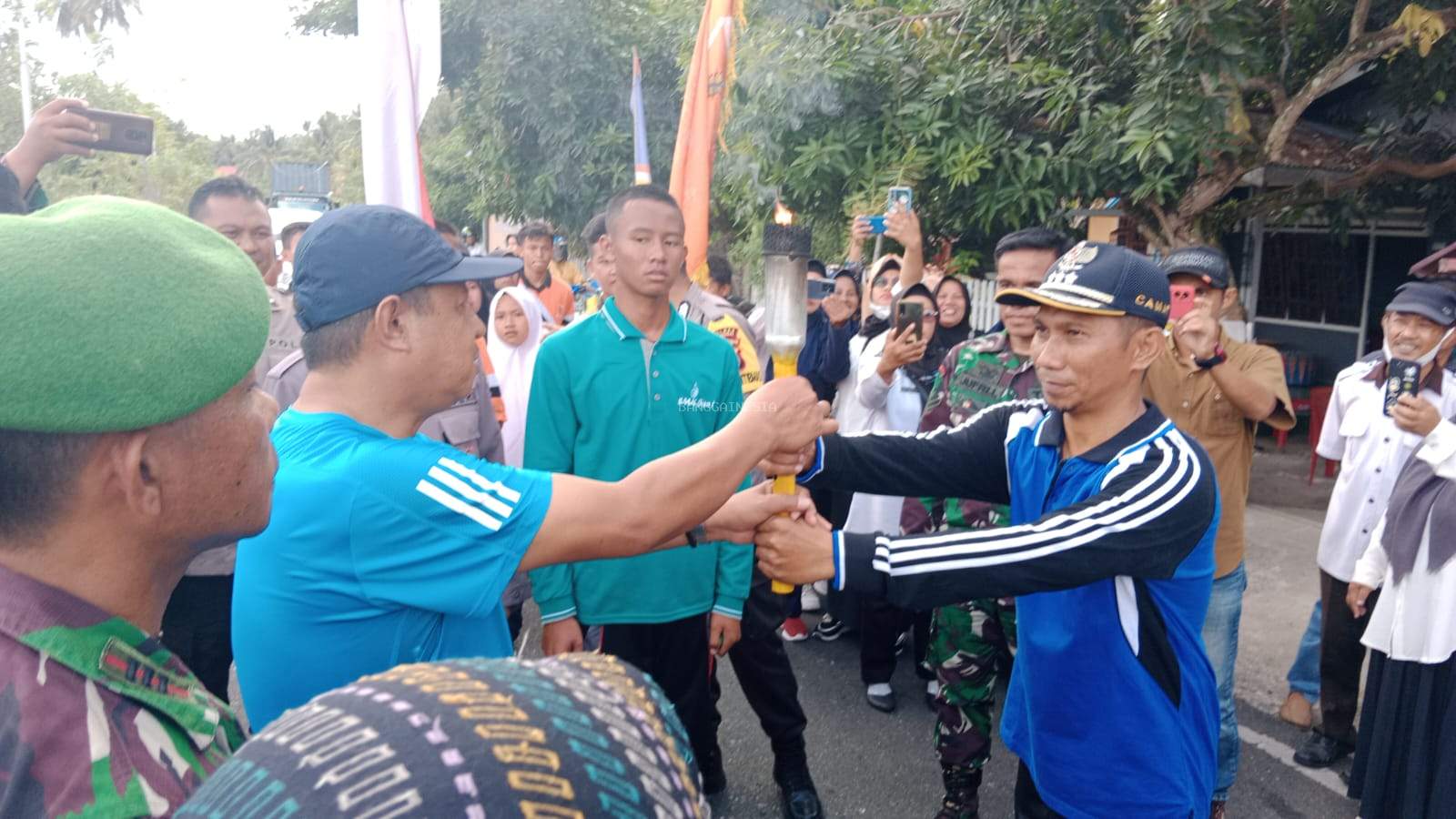 Warga Nambo Antusias Sambut Kirab Api Obor Porprov, Camat Nambo : Ini Bentuk Dukungan Masyarakat Nambo